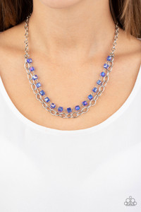 A strand of iridescent blue crystal-like cube beading joins a classic strand of silver chain below the collar, creating refined layers. Features an adjustable clasp closure.
Sold as one individual necklace. Includes one pair of matching earrings. A strand of iridescent blue crystal-like cube beading joins a classic strand of silver chain below the collar, creating refined layers. Features an adjustable clasp closure.
Sold as one individual necklace. Includes one pair of matching earrings.