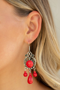 Dotted with a round red stone center, a frilly silver frame gives way to a beaded red stone fringe for a whimsical look. Earring attaches to a standard fishhook fitting.
Sold as one pair of earrings. Dotted with a round red stone center, a frilly silver frame gives way to a beaded red stone fringe for a whimsical look. Earring attaches to a standard fishhook fitting.
Sold as one pair of earrings.