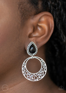 Filled with vine-like filigree, an airy silver hoop dangles from the bottom of a studded silver frame dotted with a black teardrop bead for a whimsical fashion. Earring attaches to a standard clip-on fitting.
Sold as one pair of clip-on earrings. Filled with vine-like filigree, an airy silver hoop dangles from the bottom of a studded silver frame dotted with a black teardrop bead for a whimsical fashion. Earring attaches to a standard clip-on fitting.
Sold as one pair of clip-on earrings.