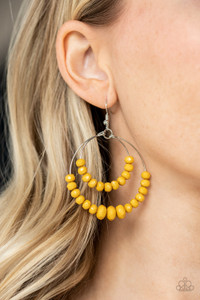 Faceted yellow beads slide along the bottom of two dangling wire hoops, creating a flirtatiously stacked lure. Earring attaches to a standard fishhook fitting.
Sold as one pair of earrings. Faceted yellow beads slide along the bottom of two dangling wire hoops, creating a flirtatiously stacked lure. Earring attaches to a standard fishhook fitting.
Sold as one pair of earrings.