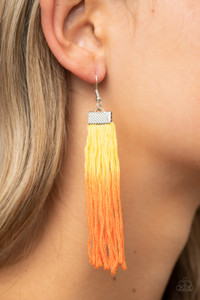 Colorful threaded tassels gradually fade from yellow to Amberglow, creating a vivacious fringe at the bottom of a hammered silver fitting. Earring attaches to a standard fishhook fitting.

Sold as one pair of earrings.