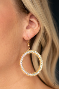 Encrusted in a glittery ring of white rhinestones, a studded gold hoop swings from the ear for a dramatic look. Earring attaches to a standard fishhook fitting.
Sold as one pair of earrings. Encrusted in a glittery ring of white rhinestones, a studded gold hoop swings from the ear for a dramatic look. Earring attaches to a standard fishhook fitting.
Sold as one pair of earrings.