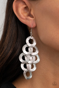 Delicately hammered in light-catching shimmer, rows of curved silver hoops delicately overlap into a noise-making lure. Earring attaches to a standard fishhook fitting.
Sold as one pair of earrings. Delicately hammered in light-catching shimmer, rows of curved silver hoops delicately overlap into a noise-making lure. Earring attaches to a standard fishhook fitting.
Sold as one pair of earrings.