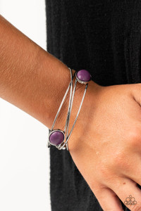 Dotted in oval purple stones, a stack of shimmery silver bangles haphazardly layer into a one-of-a-kind bracelet.
Sold as one individual bracelet. Dotted in oval purple stones, a stack of shimmery silver bangles haphazardly layer into a one-of-a-kind bracelet.
Sold as one individual bracelet.