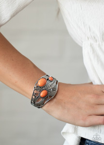 Dotted with oval orange stones, shimmery silver feather frames combine with antiqued silver filigree across the wrist, coalescing into a whimsical cuff.
Sold as one individual bracelet. Dotted with oval orange stones, shimmery silver feather frames combine with antiqued silver filigree across the wrist, coalescing into a whimsical cuff.
Sold as one individual bracelet.