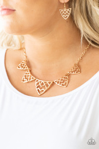 Gradually increasing in size near the center, glistening geometric fringe connects below the collar, creating an edgy fringe. Features an adjustable clasp closure.
Sold as one individual necklace. Includes one pair of matching earrings. Gradually increasing in size near the center, glistening geometric fringe connects below the collar, creating an edgy fringe. Features an adjustable clasp closure.
Sold as one individual necklace. Includes one pair of matching earrings.
