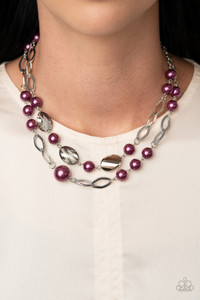 A mismatched collection of pearly purple beads, shimmery silver ovals, and metallic flecked crystal-like gems link into two polished rows below the collar, creating colorfully timeless layers. Feature an adjustable clasp closure.

Sold as one individual necklace. Includes one pair of matching earrings.
