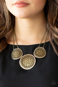 Featuring a warped finish, a trio of hammered and studded brass frames are bordered in silver as they link below the collar for a striking industrial statement. Features an adjustable clasp closure.
Sold as one individual necklace. Includes one pair of matching earrings. Featuring a warped finish, a trio of hammered and studded brass frames are bordered in silver as they link below the collar for a striking industrial statement. Features an adjustable clasp closure.
Sold as one individual necklace. Includes one pair of matching earrings.