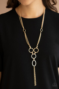 Hammered gold rings and ovals link into an industrial style pendant at the bottom of shimmery sections of gold chains. Classic gold chains stream from the bottom of the display, adding edgy movement. Features an adjustable clasp closure.

Sold as one individual necklace. Includes one pair of matching earrings.