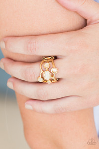 Featuring smooth and textured finishes, glistening gold bars swoop across the finger, coalescing into an airy band. Varying in shape, glowing moonstones dot the swaying bands for a refined finish. Features a stretchy band for flexible fit.
Sold as one individual ring. Featuring smooth and textured finishes, glistening gold bars swoop across the finger, coalescing into an airy band. Varying in shape, glowing moonstones dot the swaying bands for a refined finish. Features a stretchy band for flexible fit.
Sold as one individual ring.