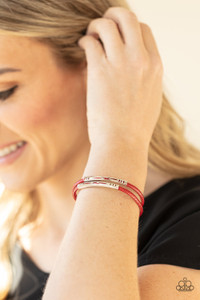 Featuring tribal inspired cutouts, stenciled silver bars slide along two shiny red cords around the wrist for an adventurous look. Features a magnetic closure.
Sold as one individual bracelet. Featuring tribal inspired cutouts, stenciled silver bars slide along two shiny red cords around the wrist for an adventurous look. Features a magnetic closure.
Sold as one individual bracelet.