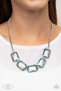 Gorgeously oversized blue emerald-cut gems boldly link below the collar, creating an iridescently icy statement piece. Features an adjustable clasp closure.
Sold as one individual necklace. Includes one pair of matching earrings. Gorgeously oversized blue emerald-cut gems boldly link below the collar, creating an iridescently icy statement piece. Features an adjustable clasp closure.
Sold as one individual necklace. Includes one pair of matching earrings.