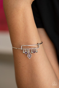 A collection of shimmery silver beads and glittery purple rhinestone accents slide along a sleek bar fitting, creating whimsical charms as they glide along the dainty silver bangle.
Sold as one individual bracelet. A collection of shimmery silver beads and glittery purple rhinestone accents slide along a sleek bar fitting, creating whimsical charms as they glide along the dainty silver bangle.
Sold as one individual bracelet.