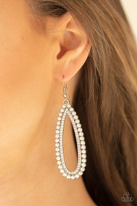 A collection of dainty white pearls surrounds a glittery row of glassy white rhinestones, stacking into a vintage inspired teardrop frame. Earring attaches to a standard fishhook fitting.

Sold as one pair of earrings.