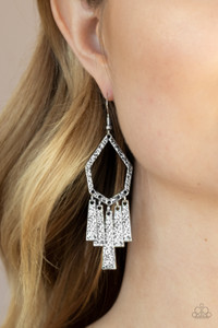 Hammered in shimmery detail, flared rectangular frames swing from the bottom of a geometric silver frame for a rustic flair. Earring attaches to a standard fishhook fitting.
Sold as one pair of earrings. Hammered in shimmery detail, flared rectangular frames swing from the bottom of a geometric silver frame for a rustic flair. Earring attaches to a standard fishhook fitting.
Sold as one pair of earrings.