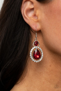 An oversized red teardrop gem is nestled inside a ring of glassy white rhinestones that attaches to an airy silver fitting adorned with a fiery oval rhinestone. Earring attaches to a standard fishhook fitting.
Sold as one pair of earrings. An oversized red teardrop gem is nestled inside a ring of glassy white rhinestones that attaches to an airy silver fitting adorned with a fiery oval rhinestone. Earring attaches to a standard fishhook fitting.
Sold as one pair of earrings.
