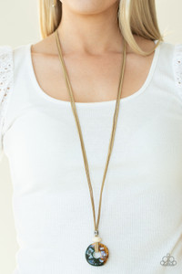 Infused with wooden and silver beads, an asymmetrical ceramic disc swings from the bottom of lengthened strands of tan suede for a colorfully earthy look. Features an adjustable clasp closure.
Sold as one individual necklace. Infused with wooden and silver beads, an asymmetrical ceramic disc swings from the bottom of lengthened strands of tan suede for a colorfully earthy look. Features an adjustable clasp closure.
Sold as one individual necklace.