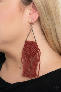 Fired Brick cording delicately knots and weaves around the bottom of an airy silver triangle, creating a colorful macramé inspired fringe. Earring attaches to a standard fishhook fitting.
Sold as one pair of earrings. Fired Brick cording delicately knots and weaves around the bottom of an airy silver triangle, creating a colorful macramé inspired fringe. Earring attaches to a standard fishhook fitting.
Sold as one pair of earrings.