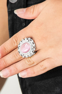 Encrusted in dainty white rhinestones, a frilly silver frame spins around a glowing pink moonstone center for a regal look. Features a stretchy band for a flexible fit.
Sold as one individual ring. Encrusted in dainty white rhinestones, a frilly silver frame spins around a glowing pink moonstone center for a regal look. Features a stretchy band for a flexible fit.
Sold as one individual ring.