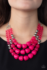 Varying in shape and opacity, a collection of round and asymmetrical pink beads are threaded along invisible wires below the collar. Shiny silver beads are sprinkled along the strands, adding hints of shimmer to the fruity layers. Features an adjustable clasp closure.
Sold as one individual necklace. Includes one pair of matching earrings. Varying in shape and opacity, a collection of round and asymmetrical pink beads are threaded along invisible wires below the collar. Shiny silver beads are sprinkled along the strands, adding hints of shimmer to the fruity layers. Features an adjustable clasp closure.
Sold as one individual necklace. Includes one pair of matching earrings.