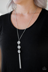 Sprinkled in glassy white and smoky hematite prism style rhinestones, three sparkling silver frames trickle down the chest. A shimmery silver tassel swings from the bottom of the triple stacked pendant for a glamorous finish. Features an adjustable clasp closure.
Sold as one individual necklace. Includes one pair of matching earrings. Sprinkled in glassy white and smoky hematite prism style rhinestones, three sparkling silver frames trickle down the chest. A shimmery silver tassel swings from the bottom of the triple stacked pendant for a glamorous finish. Features an adjustable clasp closure.
Sold as one individual necklace. Includes one pair of matching earrings.