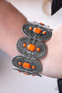 Featuring the lively hue of Turmeric, faceted orange beads are pressed into rounded silver frames radiating with tribal inspired textures. The ornate frames are threaded along stretchy bands around the wrist for a seasonal fashion.
Sold as one individual bracelet. Featuring the lively hue of Turmeric, faceted orange beads are pressed into rounded silver frames radiating with tribal inspired textures. The ornate frames are threaded along stretchy bands around the wrist for a seasonal fashion.
Sold as one individual bracelet.