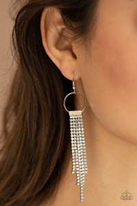 Dainty strands of glittery white rhinestones stream from the bottom of a silver fitting that glides along the bottom of a dainty silver hoop, creating a timelessly tapered fringe. Earring attaches to a standard fishhook fitting.
Sold as one pair of earrings. Dainty strands of glittery white rhinestones stream from the bottom of a silver fitting that glides along the bottom of a dainty silver hoop, creating a timelessly tapered fringe. Earring attaches to a standard fishhook fitting.
Sold as one pair of earrings.