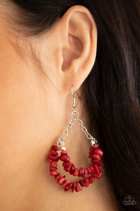 Attached to shimmery silver chains, a fiery collection of red pebble-like stones are threaded along two dainty silver wires, layering into an earthy teardrop. Earring attaches to a standard fishhook fitting.
Sold as one pair of earrings. Attached to shimmery silver chains, a fiery collection of red pebble-like stones are threaded along two dainty silver wires, layering into an earthy teardrop. Earring attaches to a standard fishhook fitting.
Sold as one pair of earrings.