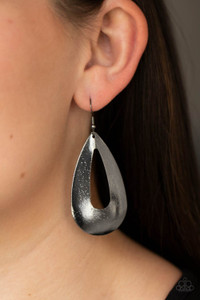 Delicately hammered in endless gunmetal shimmer, a flat glistening oval silhouette swings from the ear for a beautiful basic look. Earring attaches to a standard fishhook fitting.
Sold as one pair of earrings. Delicately hammered in endless gunmetal shimmer, a flat glistening oval silhouette swings from the ear for a beautiful basic look. Earring attaches to a standard fishhook fitting.
Sold as one pair of earrings.