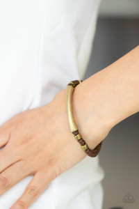 Infused with asymmetrical brass beads, a rust brass bar is knotted in place across the center of a braided brown cord for an urban flair around the wrist. Features a button loop closure.
Sold as one individual bracelet. Infused with asymmetrical brass beads, a rust brass bar is knotted in place across the center of a braided brown cord for an urban flair around the wrist. Features a button loop closure.
Sold as one individual bracelet.
