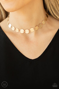 Hammered in shimmery detail, a shiny collection of dainty gold discs delicately link into a blinding display around the neck. Features an adjustable clasp closure.
Sold as one individual choker necklace. Includes one pair of matching earrings. Hammered in shimmery detail, a shiny collection of dainty gold discs delicately link into a blinding display around the neck. Features an adjustable clasp closure.
Sold as one individual choker necklace. Includes one pair of matching earrings.