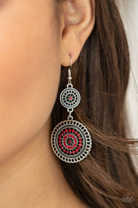 The centers of silver wheel-like frames are bedazzled in fiery red rhinestones, creating a glamorous display as the frames link into a sparkly lure. Earring attaches to a standard fishhook fitting.
Sold as one pair of earrings. The centers of silver wheel-like frames are bedazzled in fiery red rhinestones, creating a glamorous display as the frames link into a sparkly lure. Earring attaches to a standard fishhook fitting.
Sold as one pair of earrings.