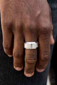 The center of a beveled silver band has been delicately hammered in shimmery detail for a metro inspired look. Features a stretchy band for a flexible fit.

Sold as one individual ring.