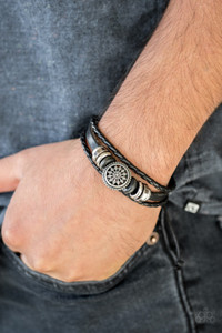 Infused with an array of wooden and metallic accents, a black leather strand and strands of braided black leather cording stack across the wrist for an edgy look. Features an adjustable sliding knot closure.
Sold as one individual bracelet. Infused with an array of wooden and metallic accents, a black leather strand and strands of braided black leather cording stack across the wrist for an edgy look. Features an adjustable sliding knot closure.
Sold as one individual bracelet.