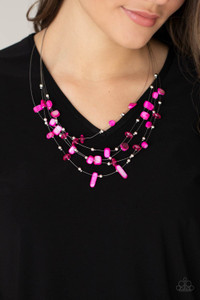 Dainty silver beads, pink crystal-like beads, and shell-like pink pebbles are fitted in place along strands of dainty wires, creating colorful layers below the collar. Features an adjustable clasp closure.
Sold as one individual necklace. Includes one pair of matching earrings. Dainty silver beads, pink crystal-like beads, and shell-like pink pebbles are fitted in place along strands of dainty wires, creating colorful layers below the collar. Features an adjustable clasp closure.
Sold as one individual necklace. Includes one pair of matching earrings.