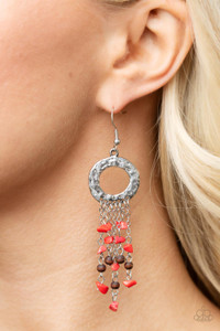 Tapered tassels of dainty wooden beads and red pebbles stream from the bottom of a hammered silver hoop, creating an earthy fringe. Earring attaches to a standard fishhook fitting.
Sold as one pair of earrings. Tapered tassels of dainty wooden beads and red pebbles stream from the bottom of a hammered silver hoop, creating an earthy fringe. Earring attaches to a standard fishhook fitting.
Sold as one pair of earrings.