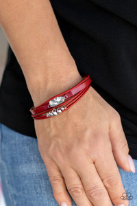 Infused with a silver beaded accent, rows of shiny red cording join a red leather band around the wrist. A hammered silver teardrop is knotted in place with red thread, adding an artisanal touch to the colorfully rustic centerpiece. Features a magnetic closure.
Sold as one individual bracelet. Infused with a silver beaded accent, rows of shiny red cording join a red leather band around the wrist. A hammered silver teardrop is knotted in place with red thread, adding an artisanal touch to the colorfully rustic centerpiece. Features a magnetic closure.
Sold as one individual bracelet.