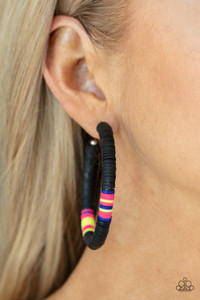 Rubbery black, pink, blue, and yellow bands are threaded along an oversized silver hoop, creating a courageous pop of color. Earring attaches to a standard post fitting. Hoop measures approximately 2 1/4" in diameter.
Sold as one pair of hoop earrings. Rubbery black, pink, blue, and yellow bands are threaded along an oversized silver hoop, creating a courageous pop of color. Earring attaches to a standard post fitting. Hoop measures approximately 2 1/4" in diameter.
Sold as one pair of hoop earrings.