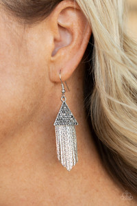 Encrusted in dainty hematite rhinestones, a silver triangle frame gives way to a tapered fringe of flat silver chains for a smoldering effect. Earring attaches to a standard fishhook fitting.
Sold as one pair of earrings. Encrusted in dainty hematite rhinestones, a silver triangle frame gives way to a tapered fringe of flat silver chains for a smoldering effect. Earring attaches to a standard fishhook fitting.
Sold as one pair of earrings.