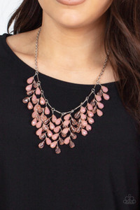 A shimmery collection of opaque and clear crystal-like Pale Rosette teardrop beads delicately cluster along a linked strand of silver bars, creating an ethereally leafy fringe below the collar. Features an adjustable clasp closure.
Sold as one individual necklace. Includes one pair of matching earrings. A shimmery collection of opaque and clear crystal-like Pale Rosette teardrop beads delicately cluster along a linked strand of silver bars, creating an ethereally leafy fringe below the collar. Features an adjustable clasp closure.
Sold as one individual necklace. Includes one pair of matching earrings.
