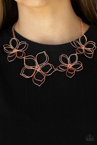 Shiny copper wire delicately twists into oversized blossoms. Varying in size, the airy floral frames delicately link into an asymmetrical display as the layered frames elegantly pop beneath the collar. Features an adjustable clasp closure.
Sold as one individual necklace. Includes one pair of matching earrings. Shiny copper wire delicately twists into oversized blossoms. Varying in size, the airy floral frames delicately link into an asymmetrical display as the layered frames elegantly pop beneath the collar. Features an adjustable clasp closure.
Sold as one individual necklace. Includes one pair of matching earrings.