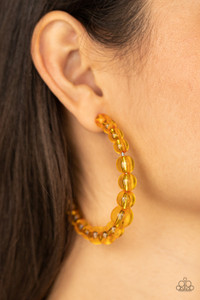 Gradually increasing in size at the center, a glassy collection of Marigold beads are threaded along an oversized hoop for a bubbly effect. Earring attaches to a stand post fitting. Hoop measures approximately 2 1/2" in diameter.
Sold as one pair of hoop earrings. Gradually increasing in size at the center, a glassy collection of Marigold beads are threaded along an oversized hoop for a bubbly effect. Earring attaches to a stand post fitting. Hoop measures approximately 2 1/2" in diameter.
Sold as one pair of hoop earrings.