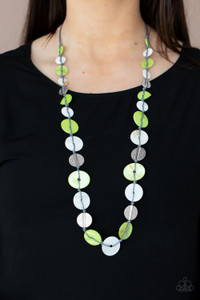 Infused with hammered silver discs, an assortment of green and white shell-like discs are knotted in place along a gray cord, creating a summery display across the chest. Features an adjustable clasp closure.
Sold as one individual necklace. Includes one pair of matching earrings. Infused with hammered silver discs, an assortment of green and white shell-like discs are knotted in place along a gray cord, creating a summery display across the chest. Features an adjustable clasp closure.
Sold as one individual necklace. Includes one pair of matching earrings.