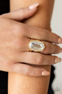 A dramatically oversized oval white gem adorns the center of a scalloped gold frame dusted in dainty white rhinestones, creating a commanding centerpiece atop the finger. Features a stretchy band for a flexible fit.
Sold as one individual ring. A dramatically oversized oval white gem adorns the center of a scalloped gold frame dusted in dainty white rhinestones, creating a commanding centerpiece atop the finger. Features a stretchy band for a flexible fit.
Sold as one individual ring.