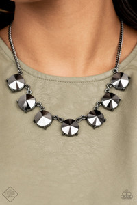 Attached to glistening gunmetal chains, a dramatic collection of oversized hematite rhinestones boldly links into a smoldering statement piece below the collar. Features an adjustable clasp closure.
Sold as one individual necklace. Includes one pair of matching earrings. Attached to glistening gunmetal chains, a dramatic collection of oversized hematite rhinestones boldly links into a smoldering statement piece below the collar. Features an adjustable clasp closure.
Sold as one individual necklace. Includes one pair of matching earrings.