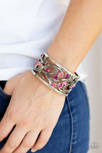 An ombre of pink rhinestones scatters across an airy floral frame among vine-like filigree. The romantically whimsical frames are threaded along stretchy bands and repeat around the wrist for an enchanting display.
Sold as one individual bracelet. An ombre of pink rhinestones scatters across an airy floral frame among vine-like filigree. The romantically whimsical frames are threaded along stretchy bands and repeat around the wrist for an enchanting display.
Sold as one individual bracelet.
