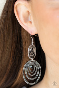 Dotted with dainty black rhinestones, hammered silver ovals join in concentric frames that link into a dizzying lure. Earring attaches to a standard fishhook fitting.
Sold as one pair of earrings. Dotted with dainty black rhinestones, hammered silver ovals join in concentric frames that link into a dizzying lure. Earring attaches to a standard fishhook fitting.
Sold as one pair of earrings.