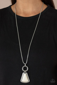 A flared triangular white stone is pressed into the center of a studded silver frame that attaches to a textured ring that is dotted with a dainty white stone, creating a dramatically earthy pendant at the bottom of a lengthened rounded mesh chain. Features an adjustable clasp closure.
Sold as one individual necklace. Includes one pair of matching earrings. A flared triangular white stone is pressed into the center of a studded silver frame that attaches to a textured ring that is dotted with a dainty white stone, creating a dramatically earthy pendant at the bottom of a lengthened rounded mesh chain. Features an adjustable clasp closure.
Sold as one individual necklace. Includes one pair of matching earrings.