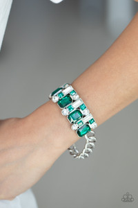 A mismatched collision of green and white rhinestone encrusted frames are threaded along a stretchy band that attaches to a chunky strand of silver chain, creating a jaw-dropping dazzle across the front of the wrist.
Sold as one individual bracelet. A mismatched collision of green and white rhinestone encrusted frames are threaded along a stretchy band that attaches to a chunky strand of silver chain, creating a jaw-dropping dazzle across the front of the wrist.
Sold as one individual bracelet.