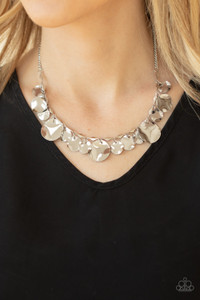 Featuring diamond shaped silver fittings, a mismatched collection of hammered silver discs swings from a classic silver chain below the collar for an eye-catching finish. Features an adjustable clasp closure.
Sold as one individual necklace. Includes one pair of matching earrings. Featuring diamond shaped silver fittings, a mismatched collection of hammered silver discs swings from a classic silver chain below the collar for an eye-catching finish. Features an adjustable clasp closure.
Sold as one individual necklace. Includes one pair of matching earrings.